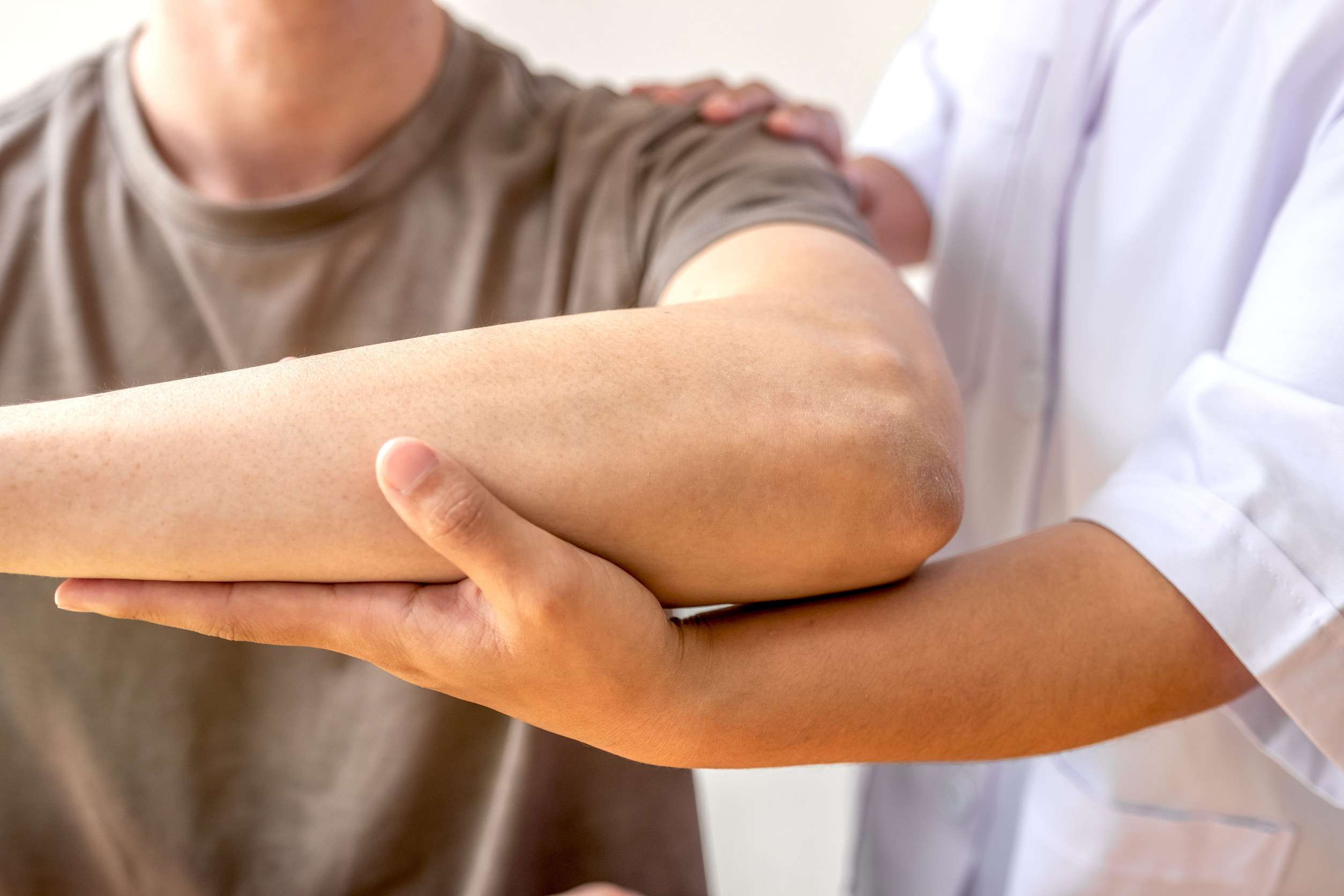 Physiotherapist working with a patient in Glasgow